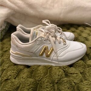 New Balance women’s ' Sneakers in White and Gold